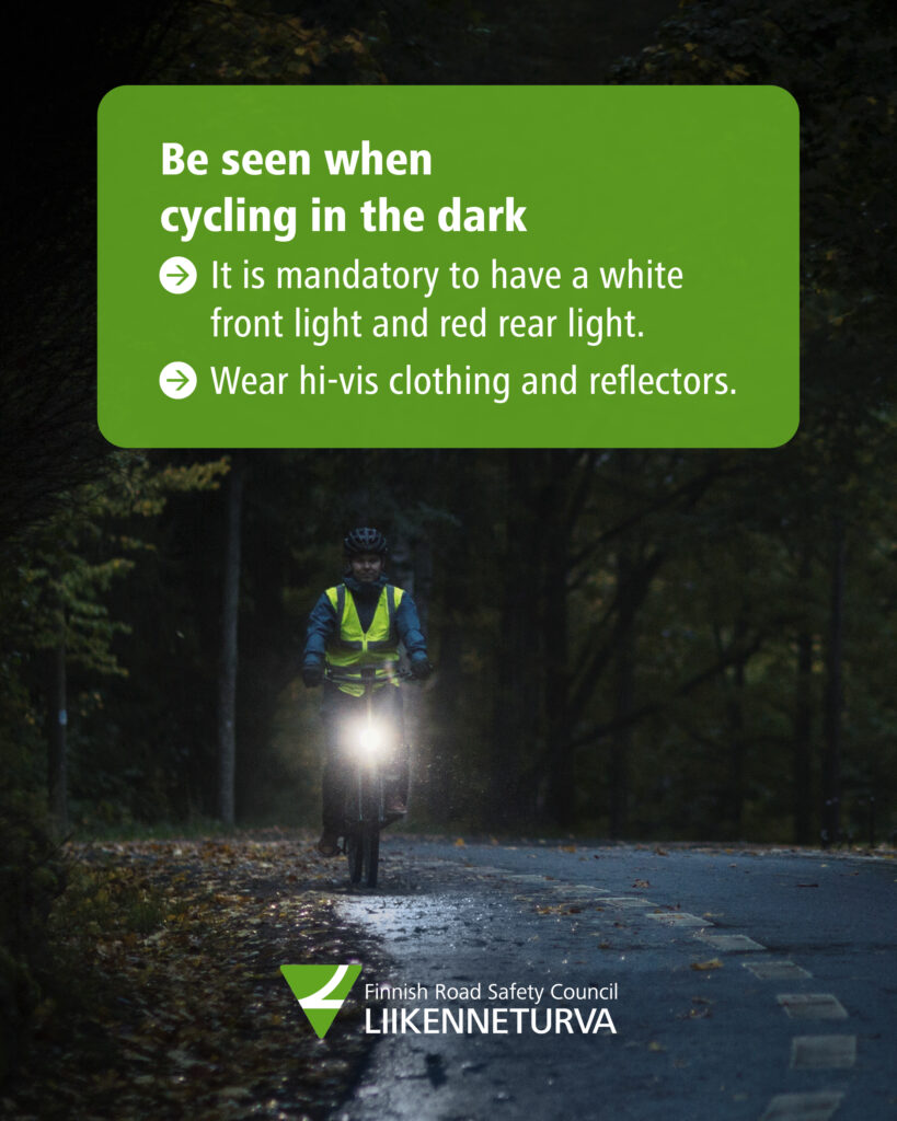 A cyclist on a dark road